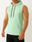 Person wearing a light green sleeveless hoodie with a Nike logo on a white background